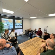 This is a picture of the ChadStone team all laughing together in a meeting