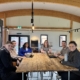 This is a photo of members of the ChadStone team having a meeting, representing discussing the 7 common habits quietly draining your business profits, time, and energy — and simple fixes to stop the leaks. Practical tips from the accountants who care